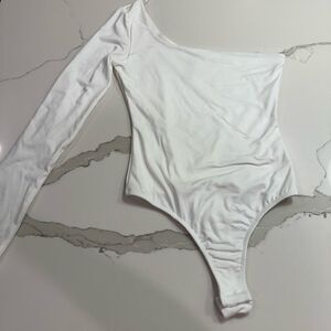 TRESSER white bodysuit. Never worn. One shoulder